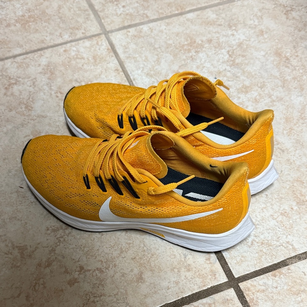 Nike Vibrant Yellow Sneakers with White and Black Accents
